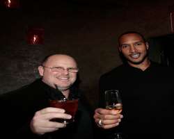 Henry Simmons consuming alcohol